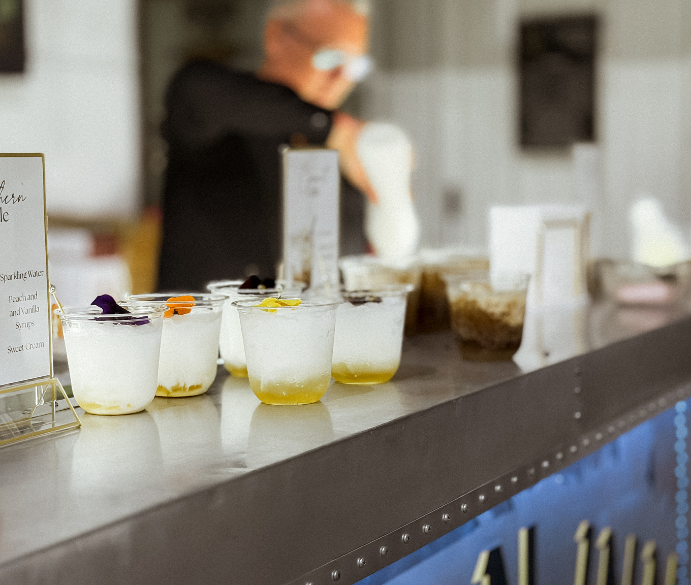 Wedding mobile bar drink setup with custom mocktails for guests