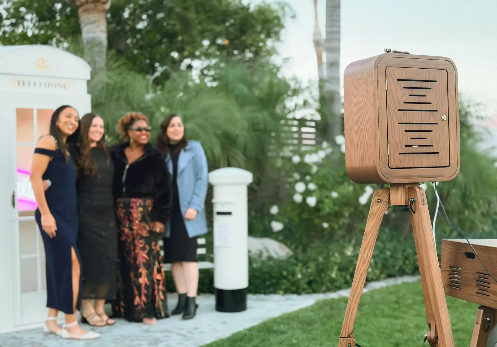 Retro-inspired mocktail bar photo booth setup at a celebration