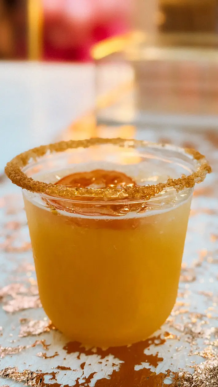 Sparkling citrus mocktail with house-made syrup and sugar rim